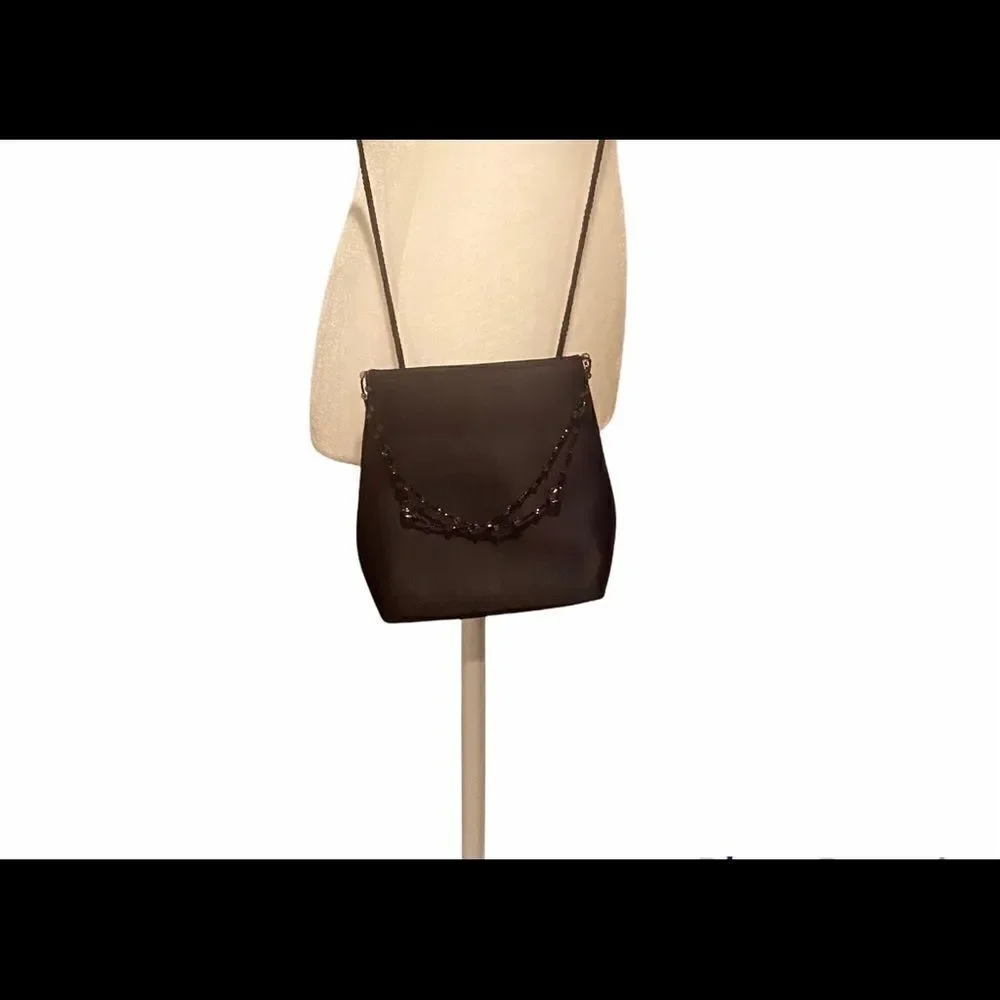 Black Elegant Bag With A Little Beading Hanging In Front